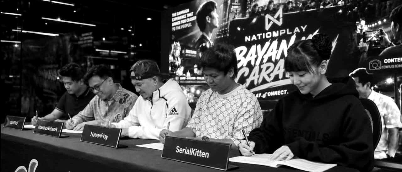 Signing of the NationPlay™ Bayan Mo Caravan partnership — representatives of CENTRO, Voxstra.Network, NationPlay, and SerialKitten signing at one table
